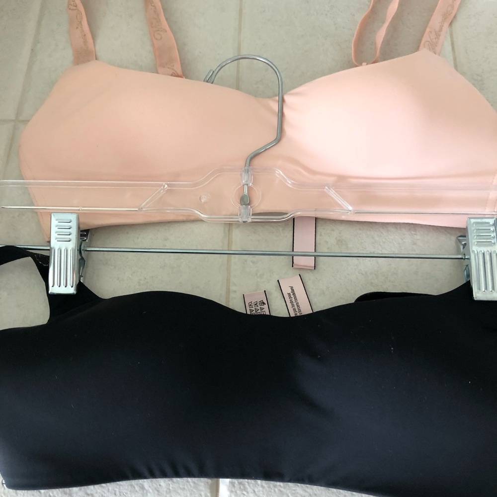 Victoria Secret’s 32A black & pale bras.